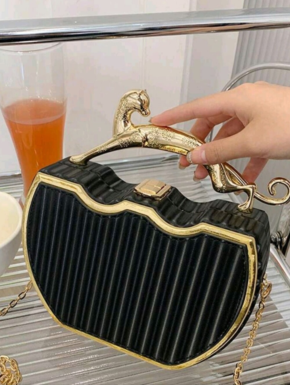 Black and Gold Heart-Shaped Evening Bag with Sculpted Handle